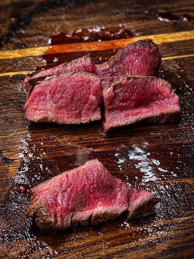 Seared beef on a cutting board