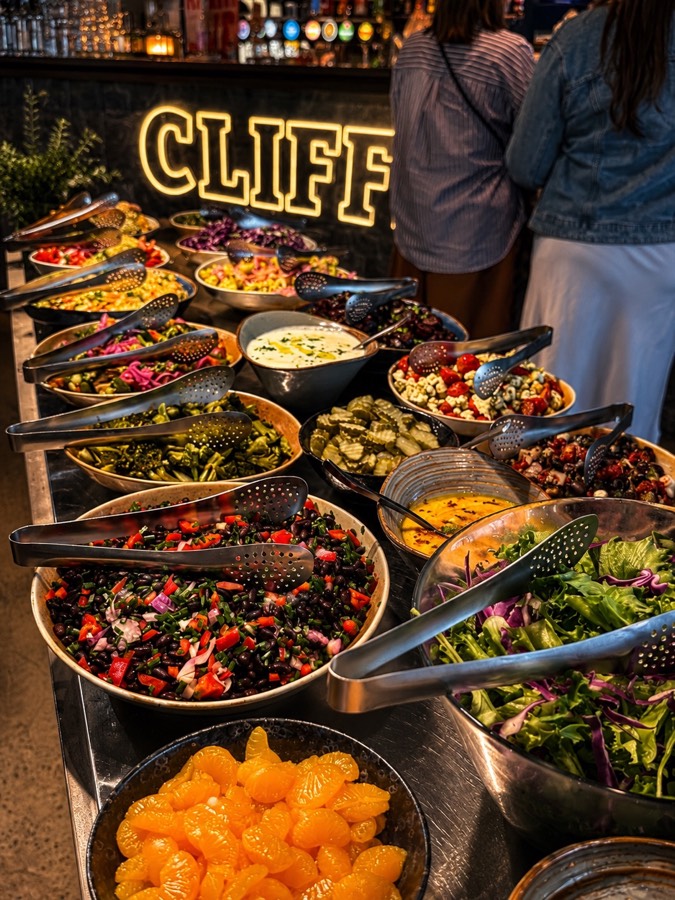 The salad bar and restaurant atmosphere at CLIFF