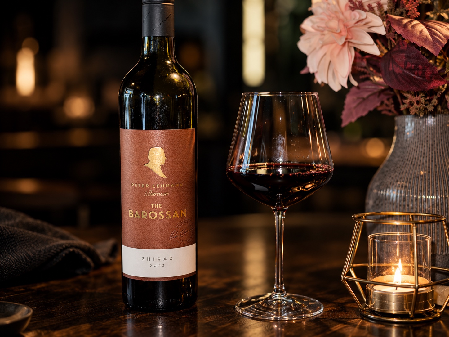 A bottle of Peter Lehmann Barossa Shiraz and a glass of red wine at CLIFF